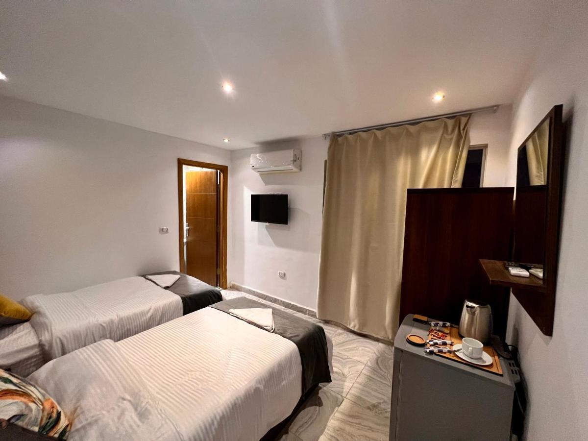 Grand Pyramids Inn Kafret el-Gabal Exterior foto