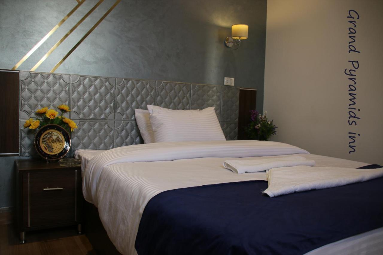 Grand Pyramids Inn Kafret el-Gabal Exterior foto