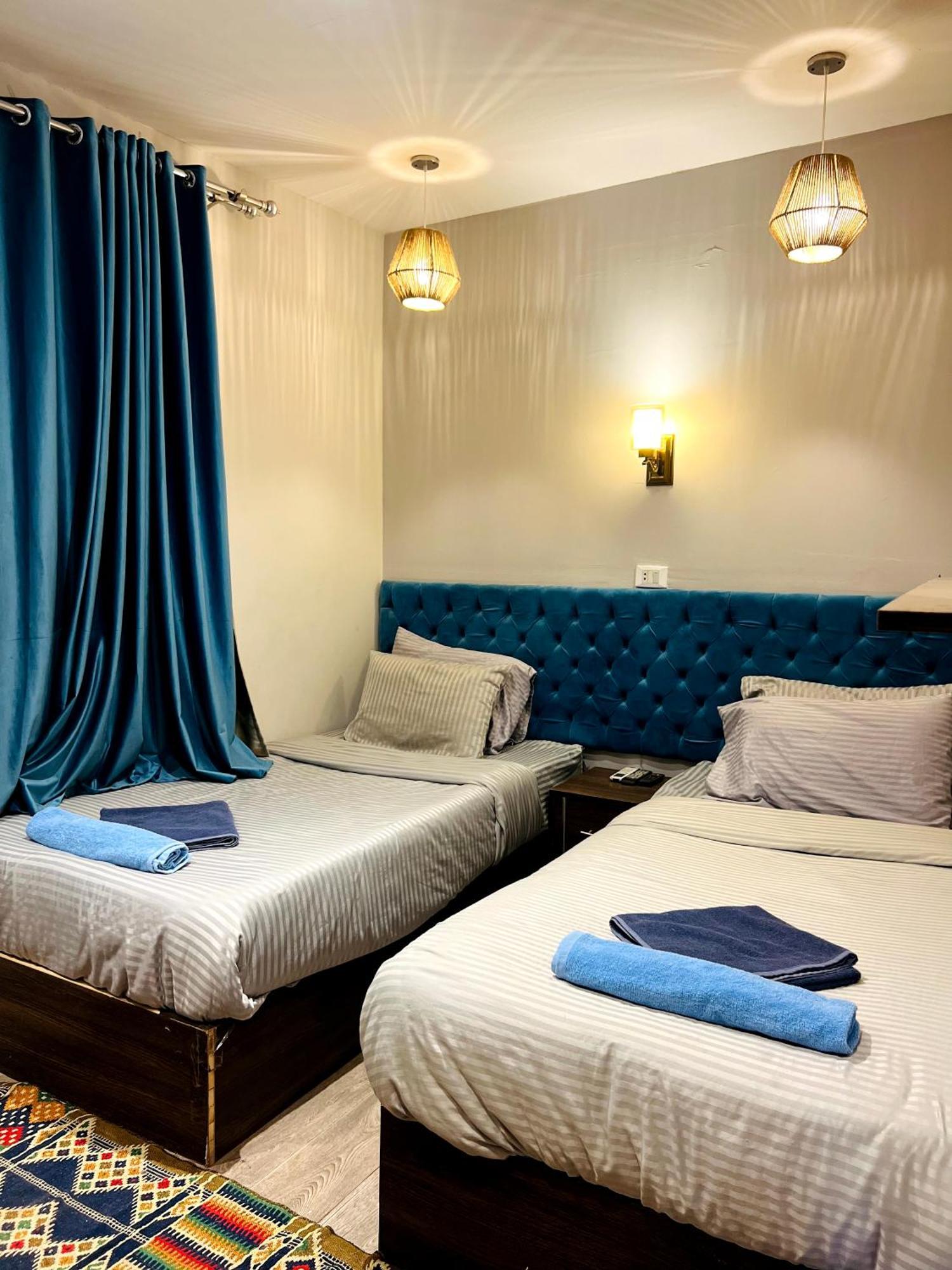 Grand Pyramids Inn Kafret el-Gabal Exterior foto
